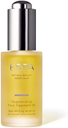 shows a bottle of ESPA Regenerating Facial Treatment oil